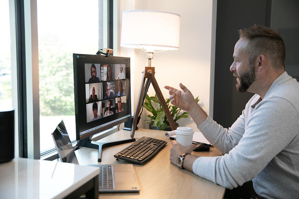 Business Coach on a Video Call with Plumbing Company Owners